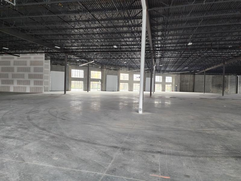 Large open concrete floor with natural light, suited to a gym or fitness studio in Chilliwack
